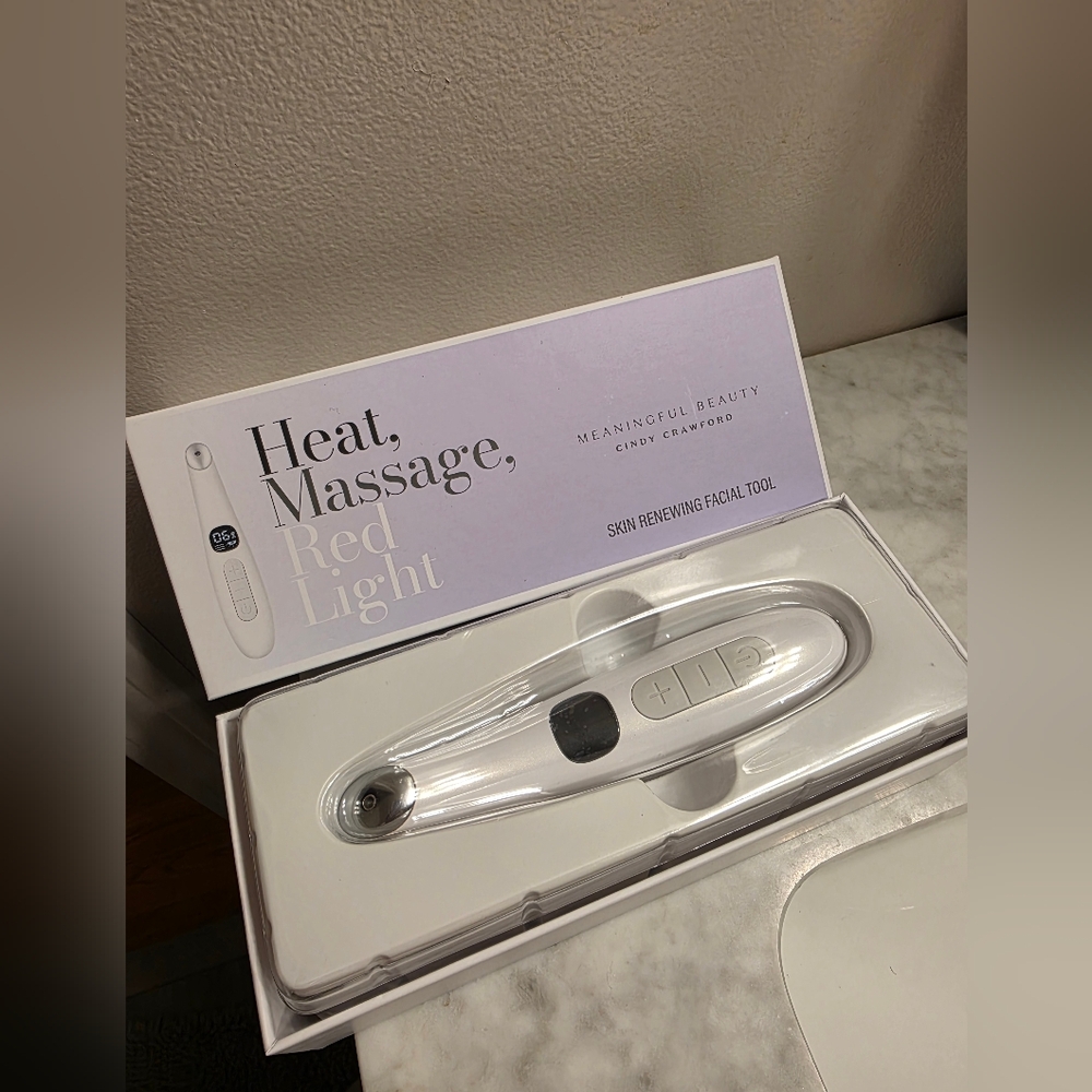 Meaningful Beauty Facial Tool with White and Silver Accents